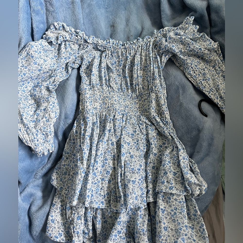Off the shoulder romper, fluffy at bottom so it appears as a dress